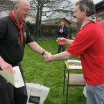 Alan Johns is presented with his Certificate for Stage 6 of the Woodbadge Trail by course leader Declan Reilly