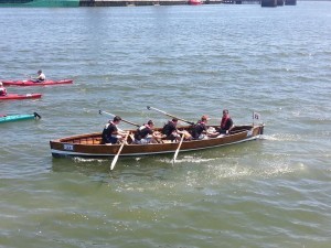 Malahide crew cross the line at Lapp's Quay , Cork
