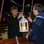 Polish Sea Scouts present light to the Deacon of Ronne,Denmark